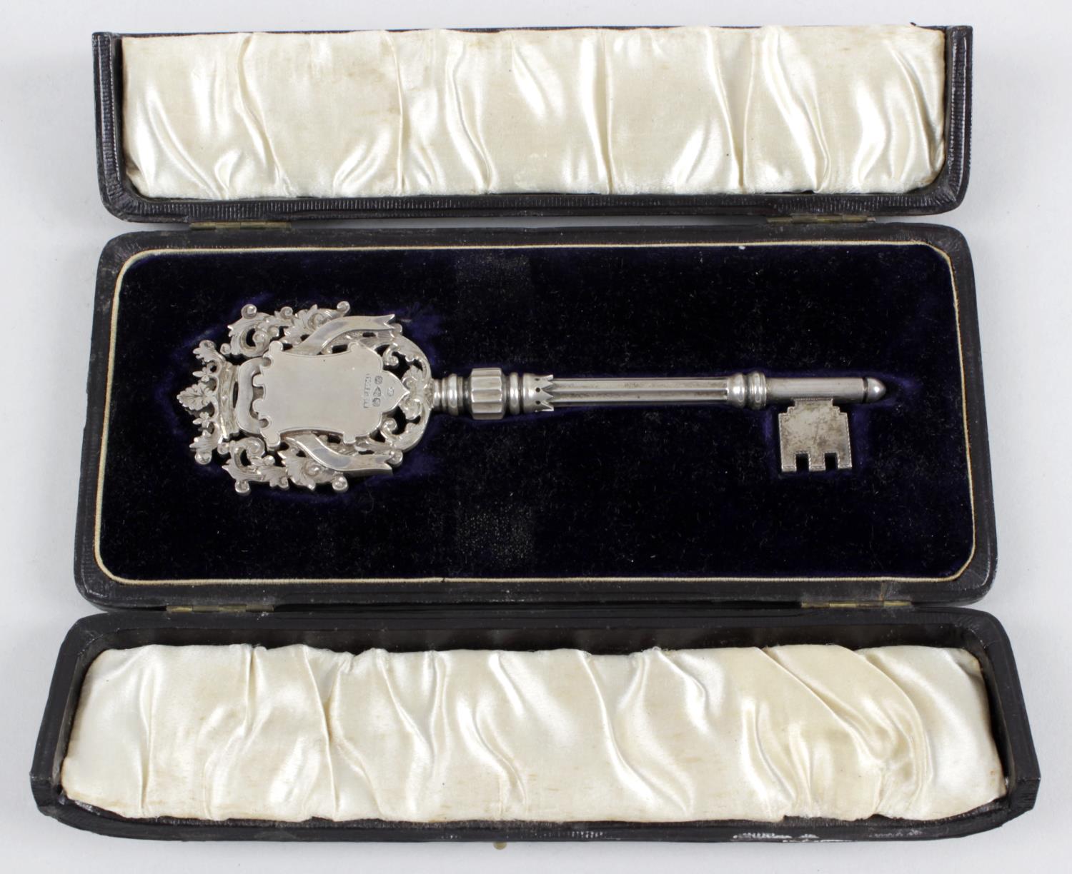 A late Victorian silver presentation key, the vacant shield terminal ...