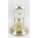 A collection of four assorted Anniversary style mantel clocks,