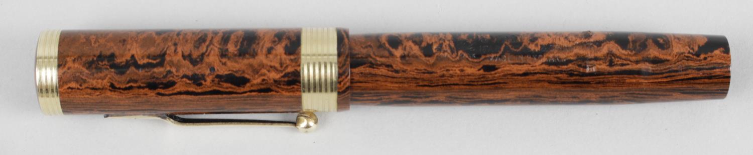 A vintage Swan Mabie Todd & Co E844B, fountain pen with fitted gold nib, the body engraved P.