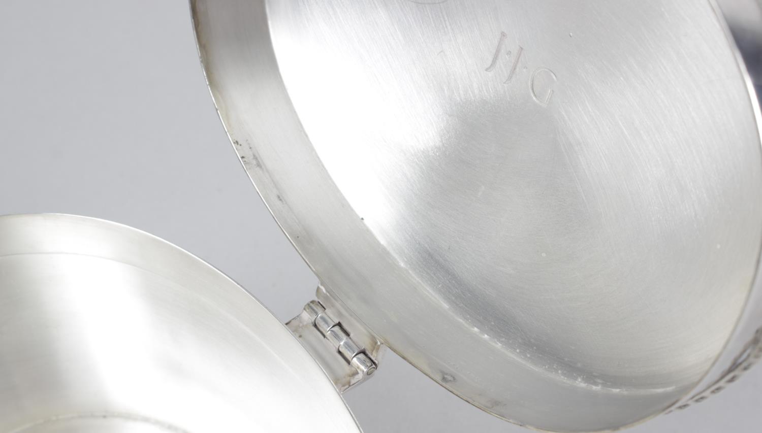 A modern silver caddy, of plain oval form with oblique gadrooned rim to the hinged cover and base. - Image 2 of 3