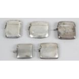 Four George V silver vesta cases,