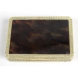 A gold mounted and tortoiseshell box,