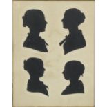 A 19th century mahogany veneered framed family group of four cut paper head and shoulder portrait