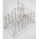 An Edwardian silver toast rack,