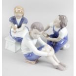 Four Bing and Grondahl figurines,