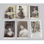 A collection of assorted vintage postcards to include war,