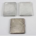 Three silver cigarette cases,