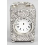 A Victorian English sterling silver cased miniature carriage clock,