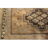 Two 20th century machine woven wool work rugs,