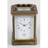 A modern Matthew Norman brass cased carriage clock with alarm,