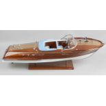 A Kiade stained and painted static model Riva speed boat with detailed open cabin,