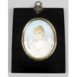 A large 19th century oval painted portrait miniature on ivory,