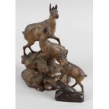 A Black Forest carved wooden animalier group,