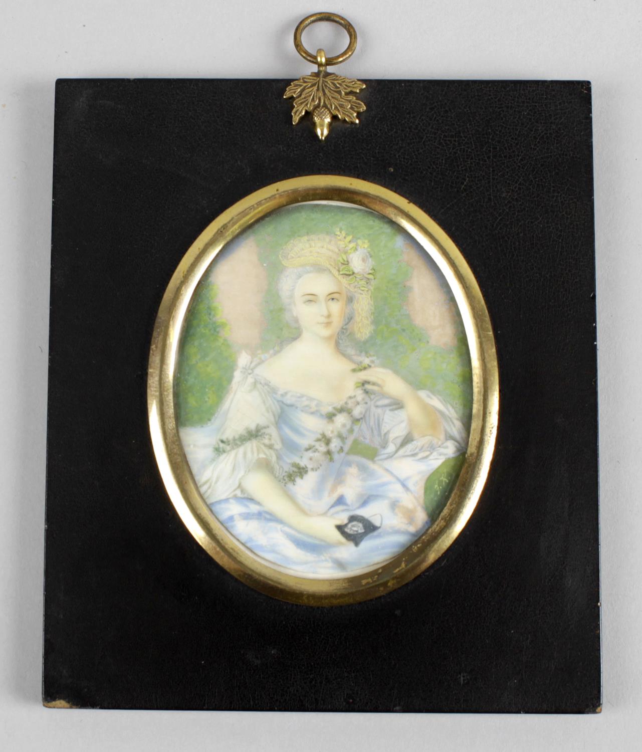 A 19th century oval painted portrait miniature on ivory,