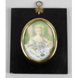 A 19th century oval painted portrait miniature on ivory,