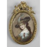 A 19th century oval painted portrait miniature on ivory,