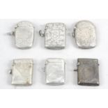 Six small silver vesta cases,