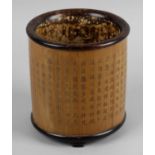 A 19th century Chinese carved bamboo bitong or brush pot,