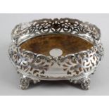A large Victorian silver mounted coaster,