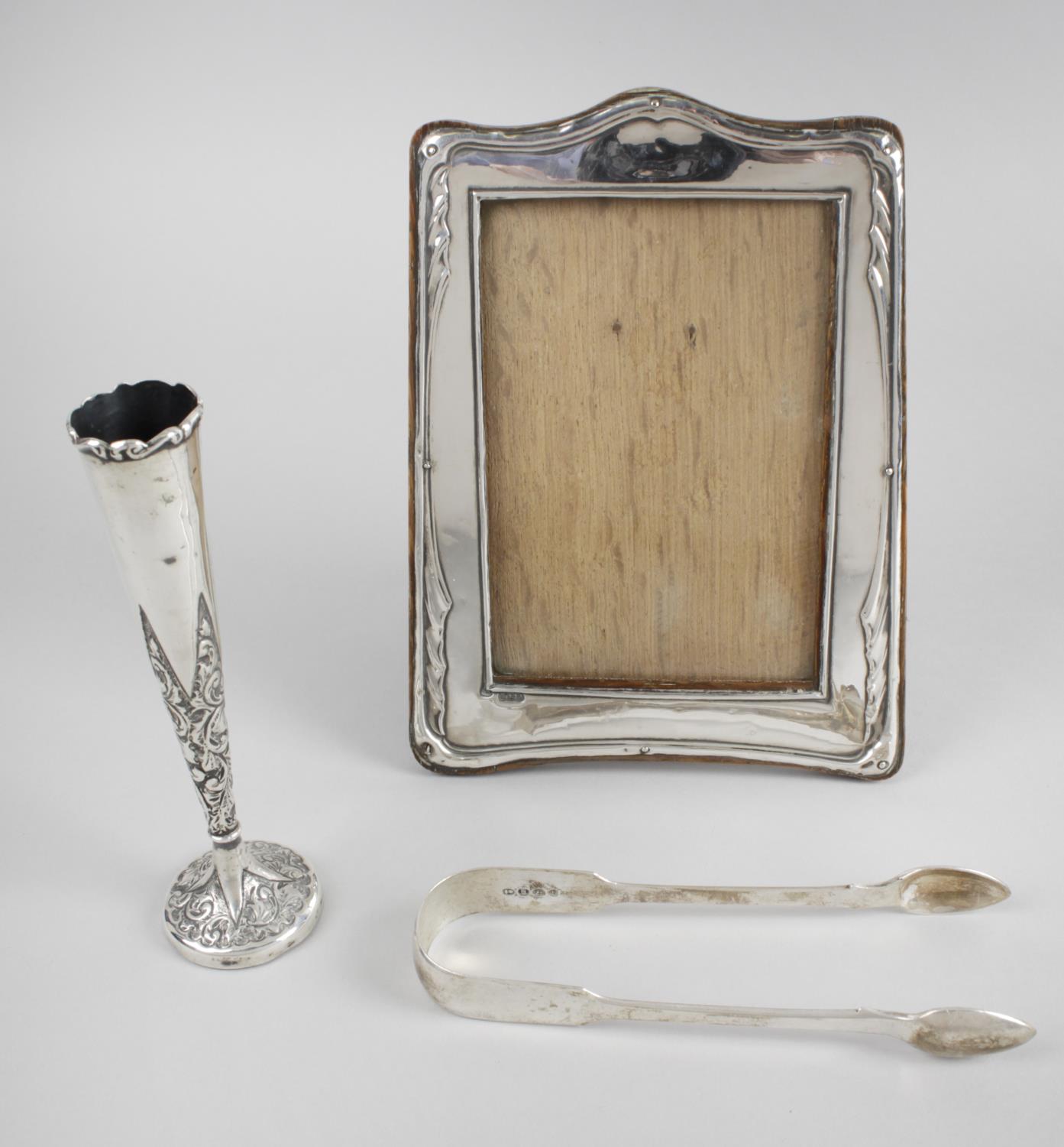 A selection of assorted silver items,