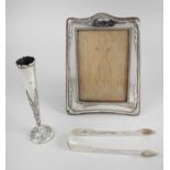 A selection of assorted silver items,