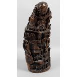 An unusual Oriental carved section of bamboo,