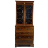 A mahogany and satinwood crossbanded secretaire bookcase,