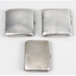 Three silver cigarette cases,