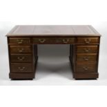 A mahogany twin pedestal desk,