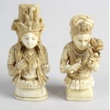 A pair of late 19th century carved ivory okimonos,
