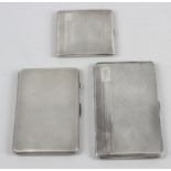 Three silver cigarette cases,