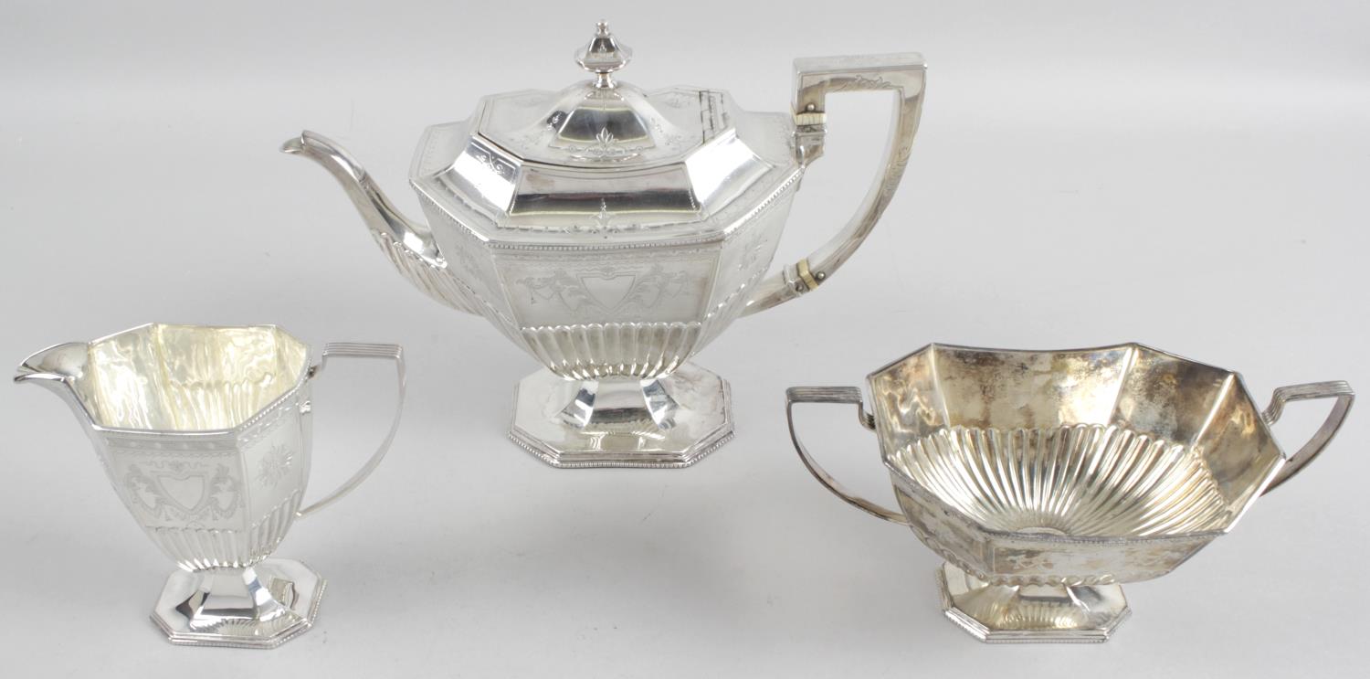 A late Victorian silver three piece tea service,