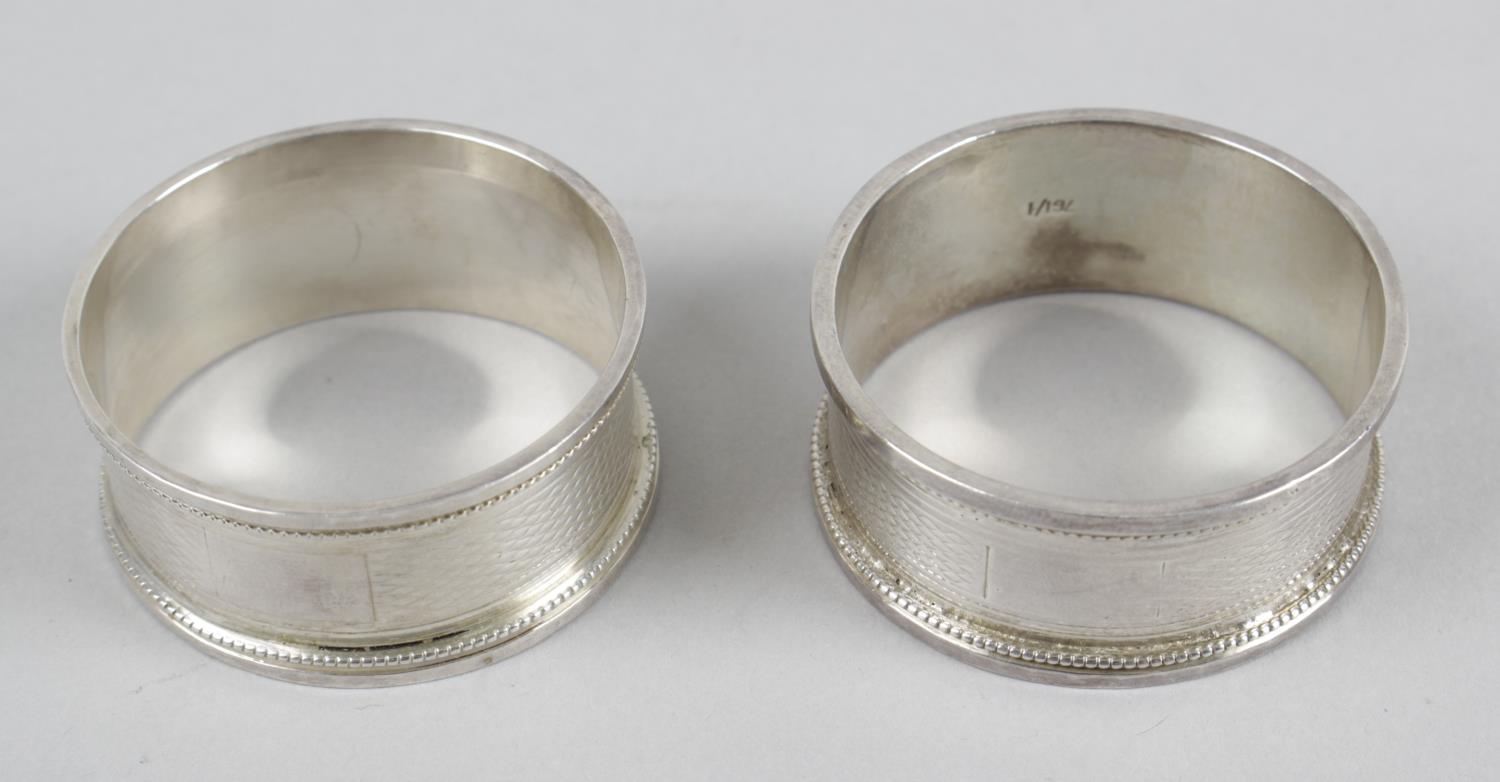 A set of six late Victorian silver napkin rings, - Image 3 of 4