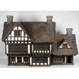 Robert Stubbs, a 1/12th scale Tudor style wooden dolls house,