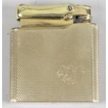 A Colibri Monogas 9ct gold cased cigarette lighter,