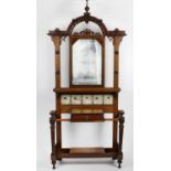 An Arts and Crafts mahogany hall stand,