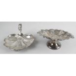 A late Victorian silver dish of shell form,