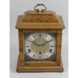 A reproduction Elliott clock company walnut cased mantel clock,