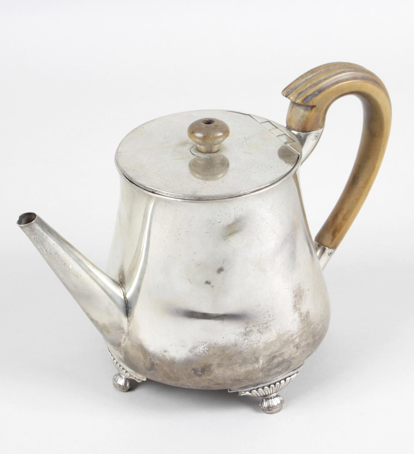 A George III silver teapot,