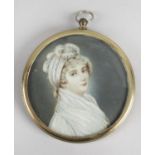 A 19th century circular painted portrait miniature upon ivory,