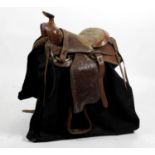A Western style leather horses saddle,
