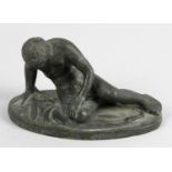 A 19th century Grand Tour souvenir bronze, modelled as The Dying Gaul, 4.5 (11.5cm) wide.