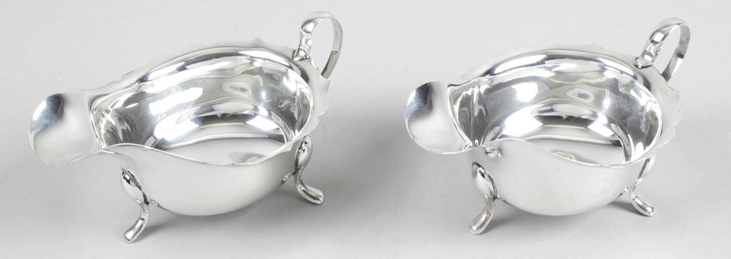 A pair of mid-twentieth century silver sauce boats,