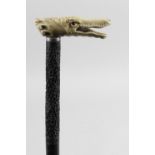 A 19th century carved ivory handled walking cane,