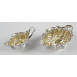 An Edwardian silver sugar bowl and matching cream jug,