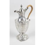 A George III silver lidded jug,