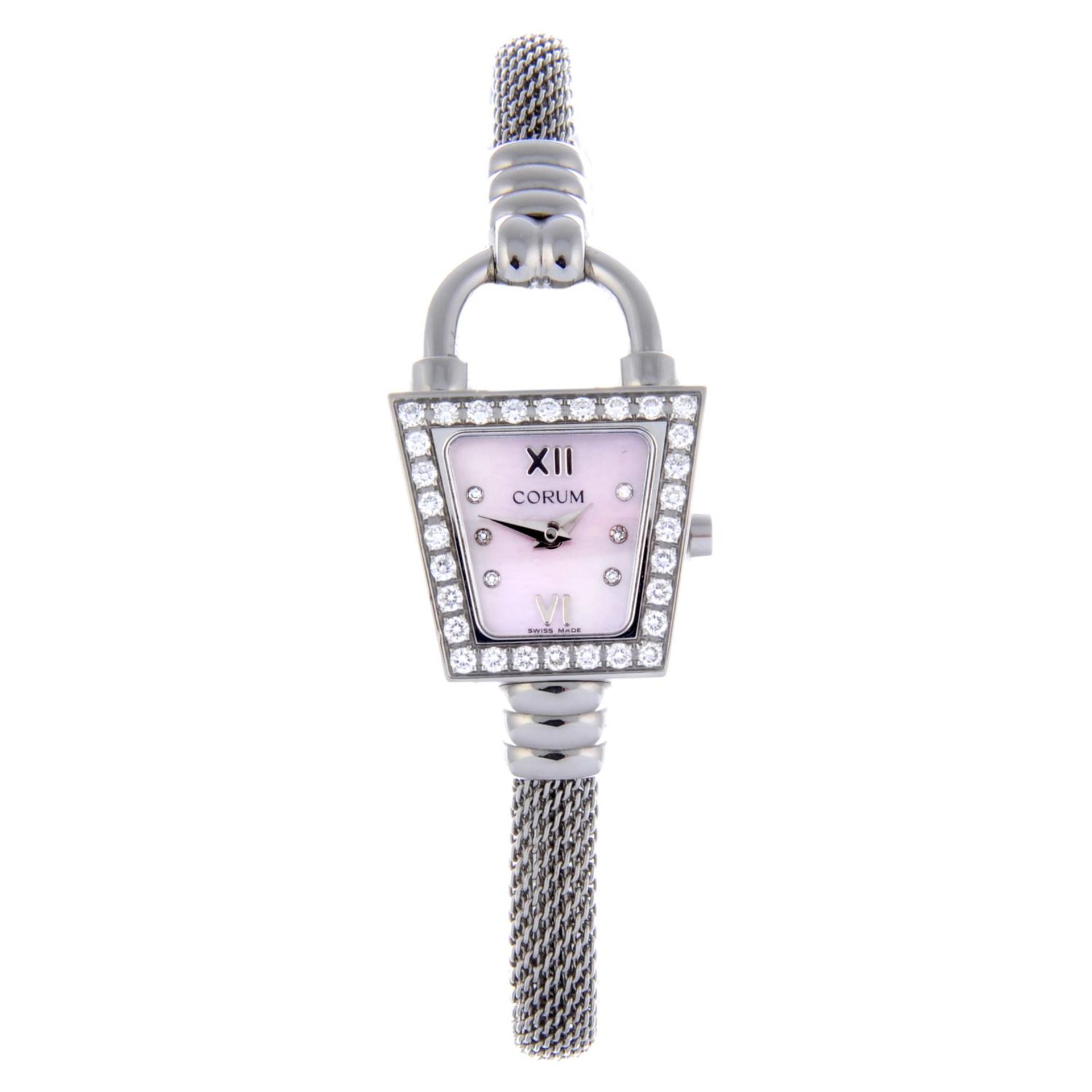 CORUM - a lady's Padlock Trapeze bracelet watch.