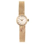OMEGA - a lady's Ladymatic bracelet watch.