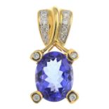 A tanzanite and diamond pendant.Tanzanite weight 2.55cts, stamped to mount.