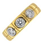 An 18ct gold diamond three-stone band ring.Total diamond weight 0.60ct,